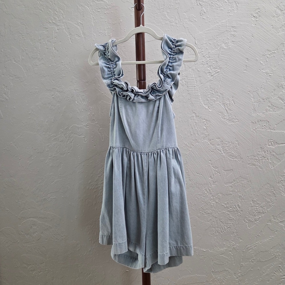 R128. Open Tie Back Smocked Ruffle Romper